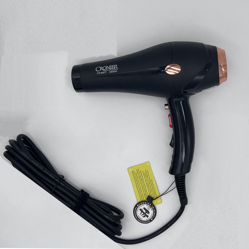 سشوار خانگی 2500 وات کرونر مدل CR-6677، موتور AC، وزن 540 گرم، دارای سری متمرکزکننده باریک، متمرکزکننده پهن با ویژگی صافکنندگی، حجمدهندگی، با قابلیت فناوری تولید یون