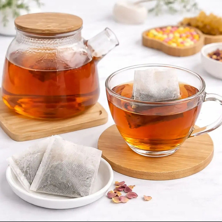 فیلتر چای ارکیده مدل کیسه ای پنچ بسته 300 عددی به همراه 5 عدد قاشق چای