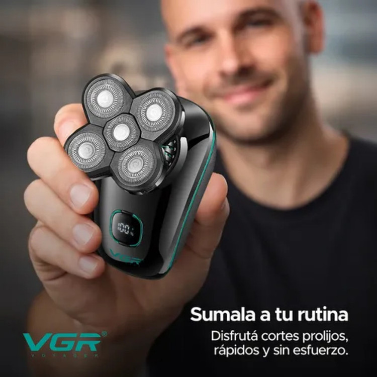 ماشین اصلاح موی سر و صورت شارژی وی جی ار مدل V-304 با سیستم برش شناور 5 بعدی، تیغه استیل ضد زنگ، باتری لیتیومی 600 میلیآمپر ساعت، شارژ سریع USB، نمایشگر LED میزان شارژ، ضد آب IPX6، قابل استفاده خشک و مرطوب